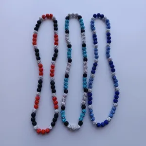 Detailed view of handmade crystal clay shamballa beaded necklaces featuring colorful rhinestone balls.