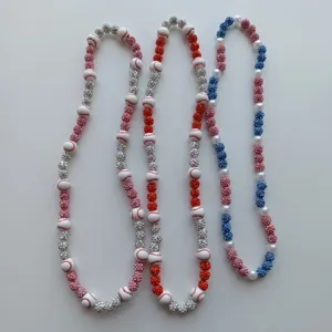 Detailed view of handmade beaded necklaces featuring baseball and rhinestone shamballa beads.
