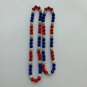 Detailed close-up of red, white and blue rhinestone crystal shamballa beaded elastic necklace.