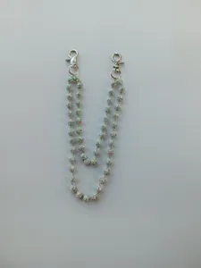 Close-up of 12mm sparkling rhinestone clay bead chain with silver lobster clasps