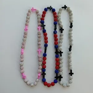 Detailed view of handmade shamballa rhinestone clay bead cross necklaces in vibrant multi-colors.