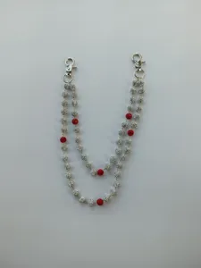 Detail view of 12mm silver and red rhinestone clay ball double-layered pant chain