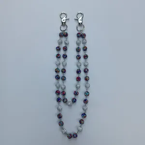 Macro view of double-strand pants chain with 12mm colorful rhinestone disco ball beads