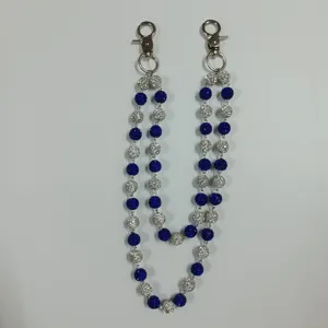 Detailed view of 12mm blue and silver rhinestone beads on hip hop style wallet chain