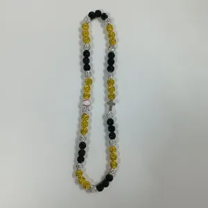 Detailed view of athletic baseball Shamballa rhinestone beaded necklace in black yellow and silver.