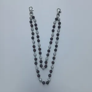 Detailed view of a 12mm rhinestone encrusted bead chain with silver lobster clasps