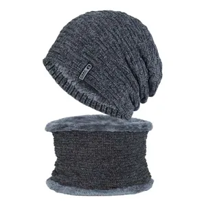 Close-up detail of dark grey winter knitted beanie and thermal plush lined neck warmer set.