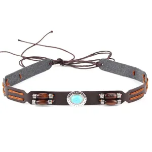 Gedetailleerd overzicht van vintage boho riem met turkoois en kralen
