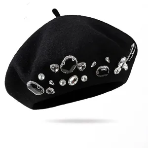 Detailed view of the elegant black wool beret adorned with sparkling rhinestones for winter style.