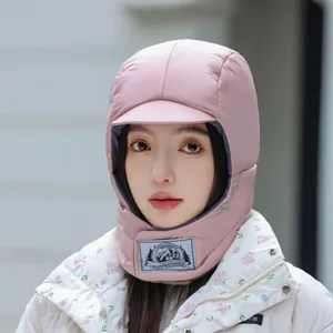 Pink winter windproof trapper hat with warm earflaps and soft fleece lining for cold weather.