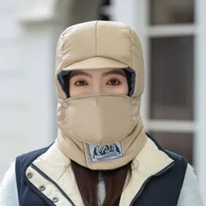 Beige winter trapper hat with fleece lining, integrated earflaps and windproof face mask.