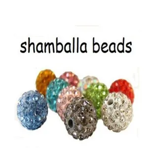 Detailed view of colorful 10mm rhinestone-studded shamballa clay beads