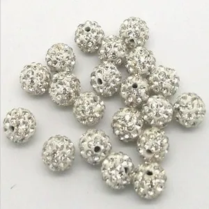 White rhinestone clay Shamballa beads detail view, perfect for DIY jewelry craft making.