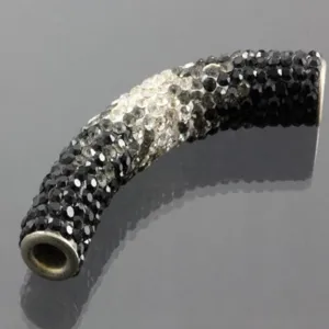 Macro view of 45mm gradient rhinestone Shamballa curved tube bead for DIY jewelry.