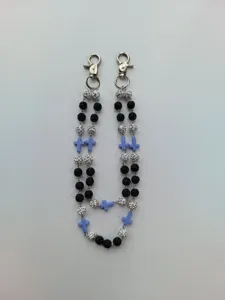 Detail view of hip-hop pants chain featuring 12mm rhinestone beads and blue crosses