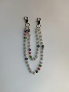 Close-up detailed view of 12mm colorful rhinestone bead chain for hip hop style pants or bags