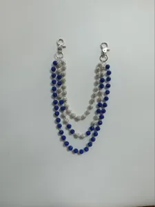 Detailed view of triple-layered 12mm blue and silver rhinestone bead pants chain