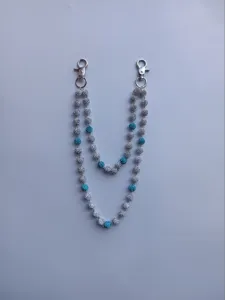 Close-up of 12mm rhinestone clay bead double-layer pants chain featuring blue accents and metal clasps