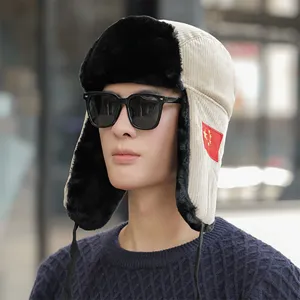 Winter Corduroy Ushanka Hut mit warmen Kunstpelz Ohrklappen und modischem Patch.