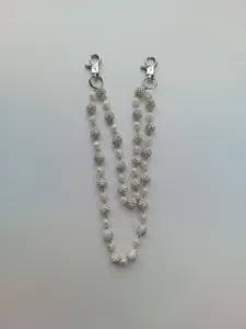 Detail view of hip hop pants chain with 12mm rhinestone disco balls and silver clasps