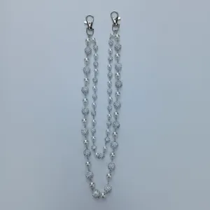 Double-layered pants chain with white pearls and sparkling rhinestone clay balls.