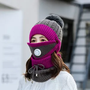 Detailed close-up of winter knitted hat with breathing valve, windproof face mask and neck warmer.