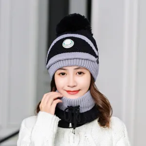 Women winter knitted beanie hat and neck warmer set with pom-pom and windproof valve design.