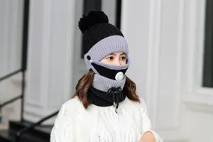 Detail view of the winter knitted warm hat with breathing valve and face cover for cold weather.