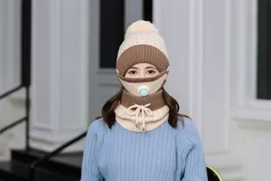 Warm winter knitted hat with breathing valve windproof ear protection for women.