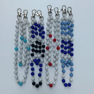 Detailed view of 12mm sparkling rhinestone bead chains in multiple colors for hip hop fashion
