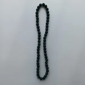 Dark green rhinestone clay beads Shamballa necklace detail view sparkling fashion jewelry