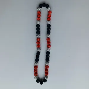 Red white and blue rhinestone beaded necklace detail view, vibrant handmade fashion jewelry piece.