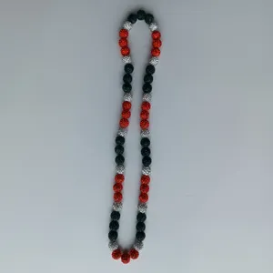 Handmade Shamballa rhinestone clay beads elastic necklace in red, green and silver colors.