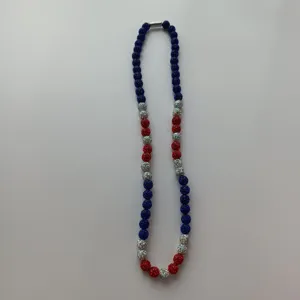 Detailed view of colorful beaded necklace with blue silver red rhinestone balls and clasp.