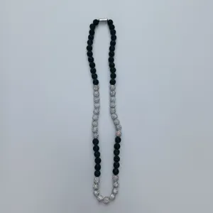 Detailed view of sparkling Shamballa rhinestone bead necklace with black silver disco balls.