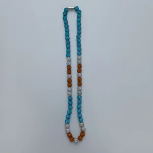 Detailed shot of a colorful shamballa beaded necklace with sparkling crystal round beads.