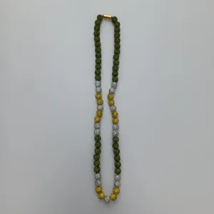 Close-up detail of the colorful rhinestone clay bead necklace featuring sparkly round beads.