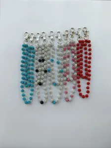 Detailed view of colorful 12mm rhinestone clay bead chains for pants or bags.
