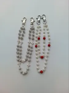 Close-up detail view of 12mm rhinestone ball and acrylic flower hip-hop waist chains