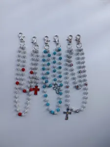 Detailed view of 12mm rhinestone disco bead pants chains with cross pendants in various colors