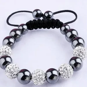 Close-up detail of 10mm Shamballa bracelet with sparkly pave beads and dark hematite beads