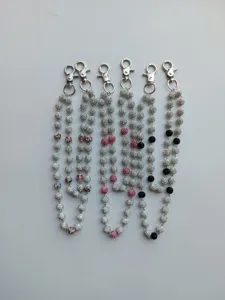 Detailed view of 12mm rhinestone clay bead hip hop pant chains with metal clasps