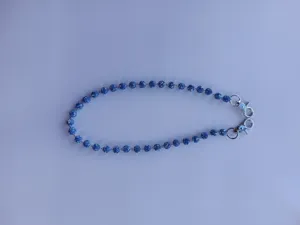 Detailed close-up view of the sparkling blue rhinestone shamballa ball chain with metal hooks.