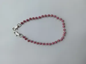 Pink rhinestone ball chain detail view, crystal bead pendant accessory for pants and waist.