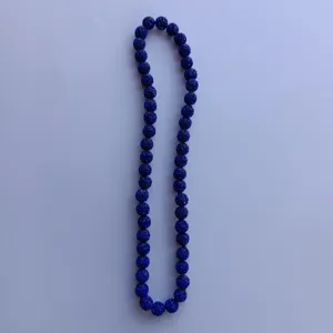 Detailed view of dark blue Shamballa rhinestone clay bead strand, ideal for custom jewelry crafts.