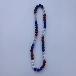Detailed view of red, white and blue rhinestone disco ball bead elastic necklace, stylish jewelry.