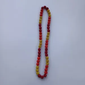 Red and gold rhinestone disco ball bead necklace detailed view, sparkling clay bead jewelry.
