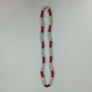 Red and silver rhinestone clay bead necklace detail close-up view displaying sparkle.