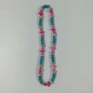 Colorful beaded shamballa necklace with pink cross charms and sparkly round beads.