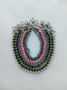 Detailed view of colorful 12mm rhinestone disco ball chains with silver lobster clasps